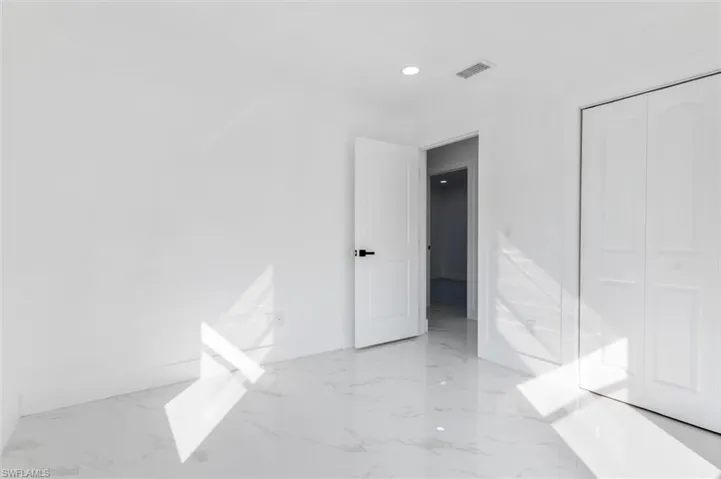 Unfurnished bedroom featuring a closet