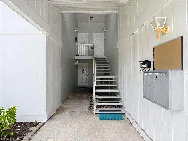 Stairs featuring concrete floors