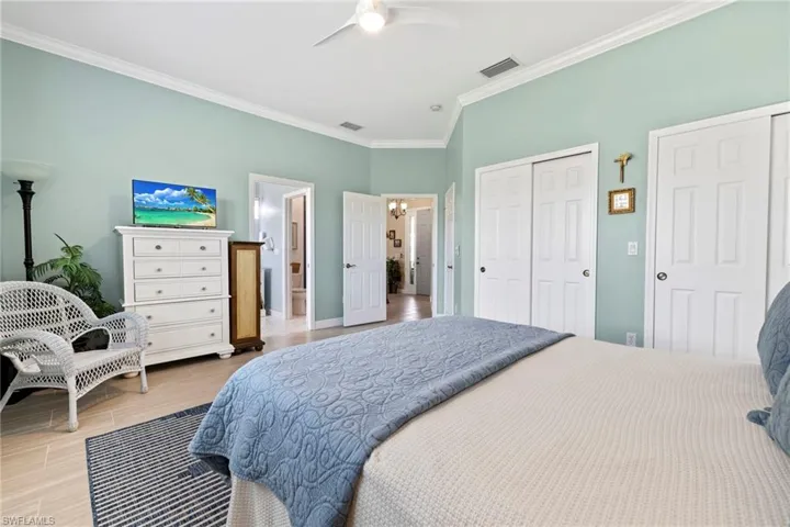 Walk in closets, opening onto bath and foyer.