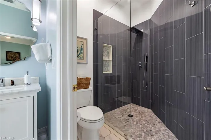 All newly renovated shower and toilet, separate from main bathroom.