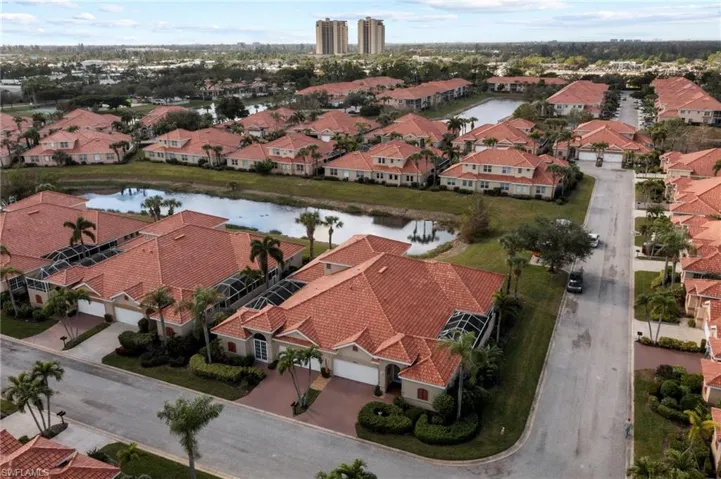 Bird's eye view featuring a water view, community.
