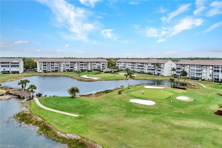 Aerial view of a nearby body of water and a local golf course