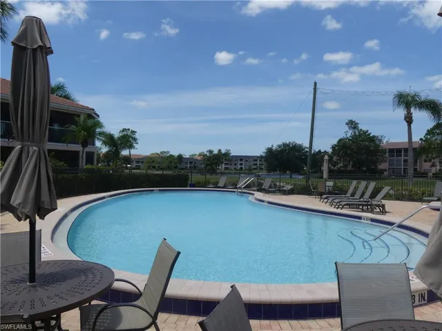 COMMUNITY POOL WITH GOLF COURSE VIEWS