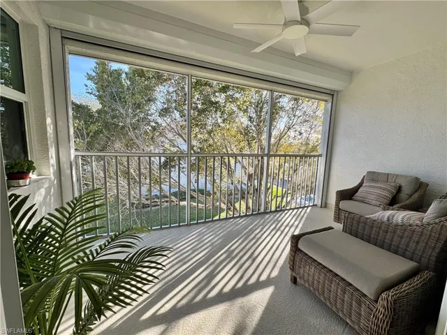 Lanai featuring ceiling fan and a balcony