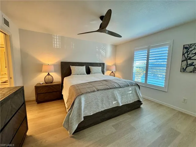 Master Bedroom featuring a ceiling fan and light wood-style floors
