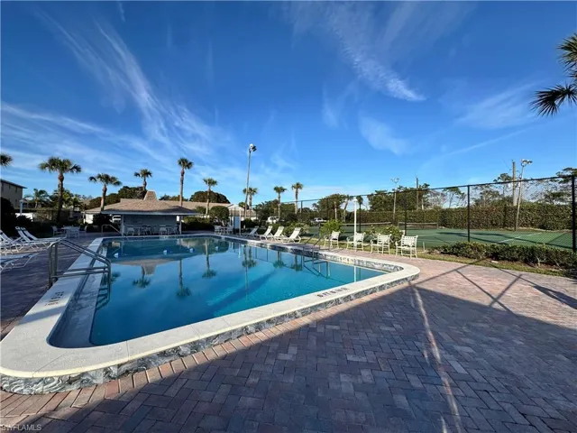 Community pool featuring a patio area