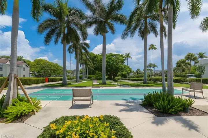 View of pool with shuffleboard
