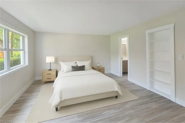 Bedroom with light wood-style floors