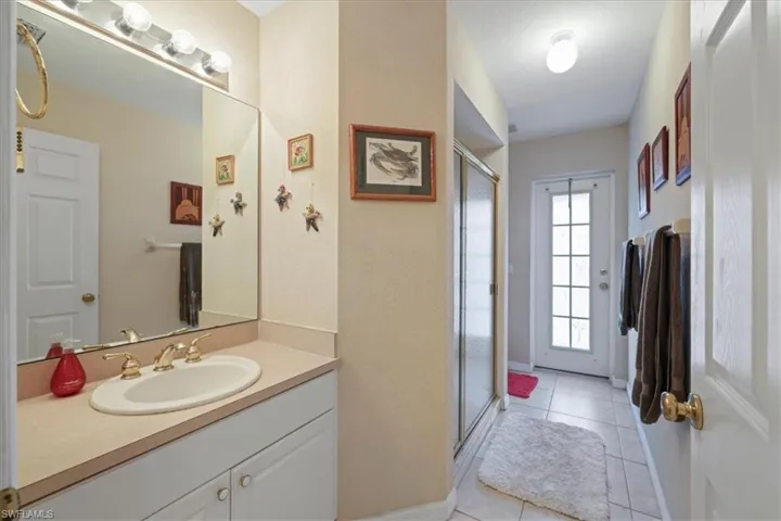 Full bathroom with pool access