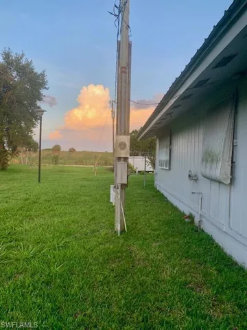 View of yard at dusk