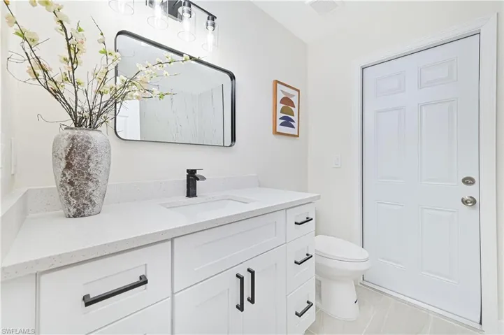 guest bathroom with access to lanai