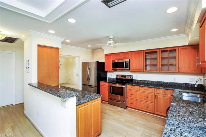 Wood cabinets, granite countertops