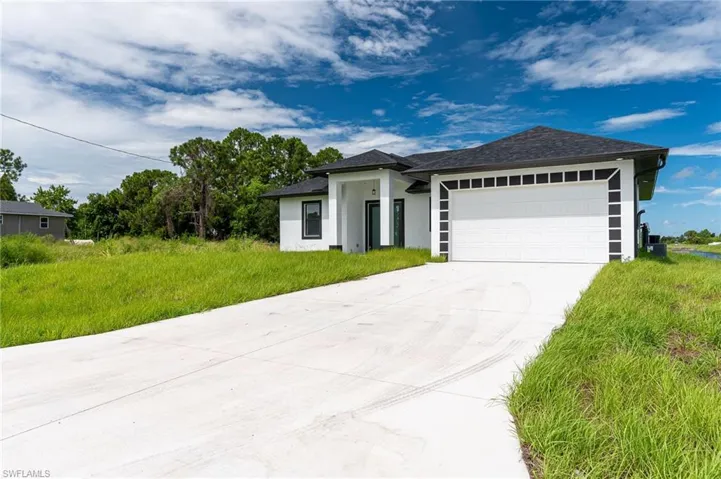 Ranch-style house with a garage