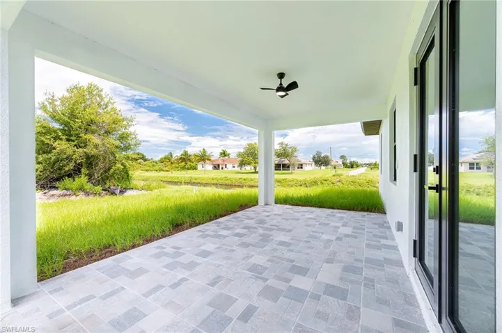 View of open lanai with ceiling fan