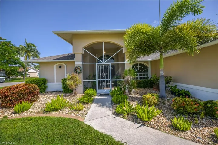 nice landscaping and front design of the entry way