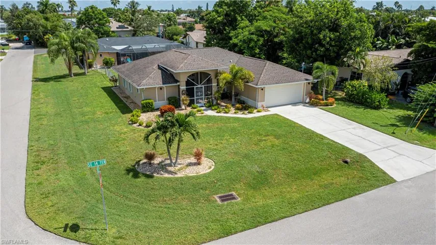 CORNER oversized lot, lush landscaping with curbing