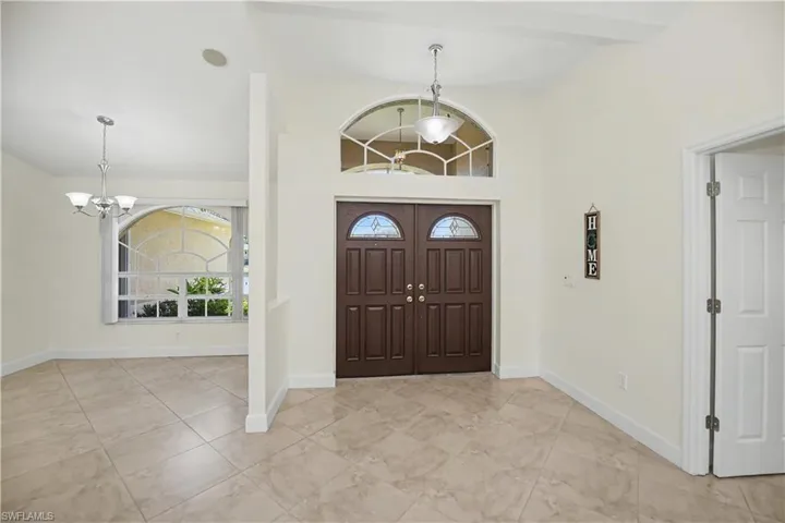 solid wood double doors, beveled glass, attention to details