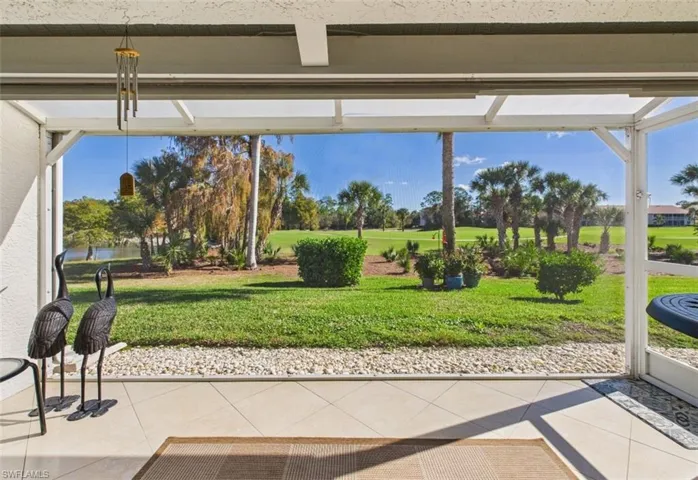 View of patio / terrace with a sunroom