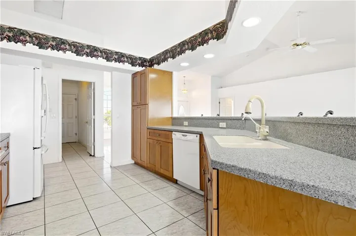 Kitchen, solid surface countertops and lots of cabinets