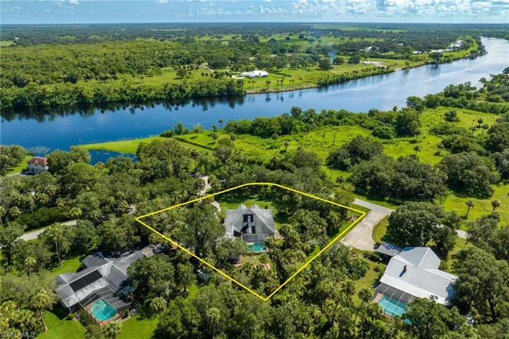 865 E Fort Thompson Avenue, LaBelle, FL 33935 - 4BR/4BA Family Home with Pool + 1 Acre