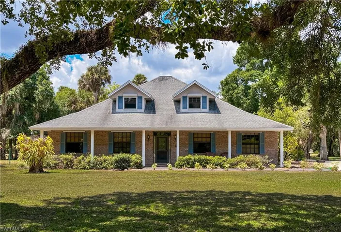 865 E Fort Thompson Avenue, LaBelle, FL 33935 - 4BR/4BA Family Home with Pool + 1 Acre