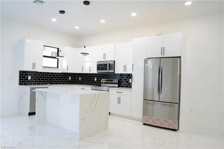 2436/2438  Venice N AVE, Lehigh Acres, FL 33971
