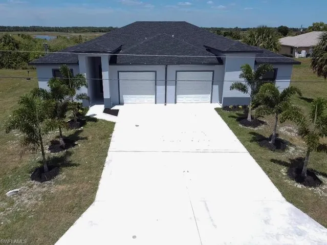 2436/2438  Venice N AVE, Lehigh Acres, FL 33971