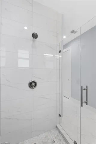 Bathroom featuring an enclosed shower