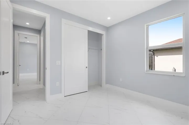 Unfurnished bedroom with a closet