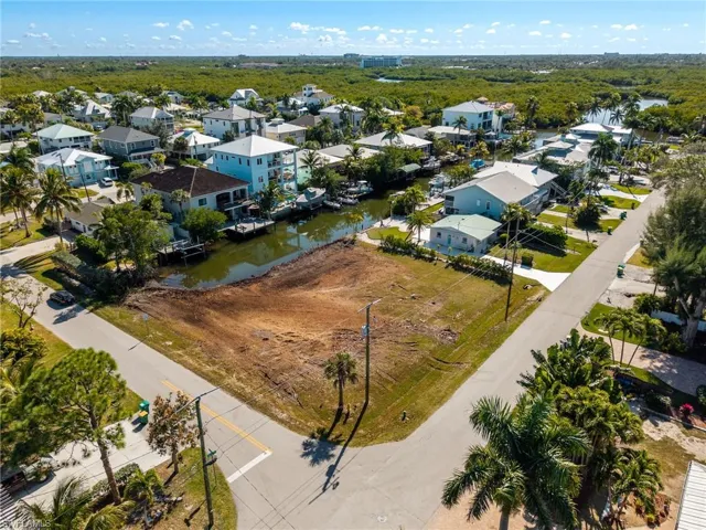 Aerial view of residential area with a nearby body of water