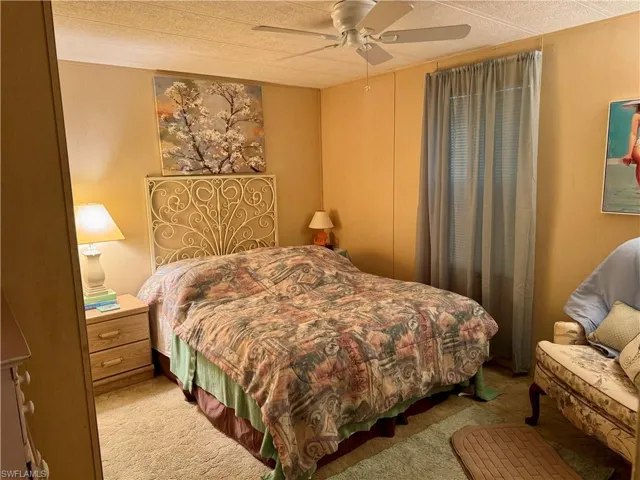 Bedroom with carpet floors and ceiling fan