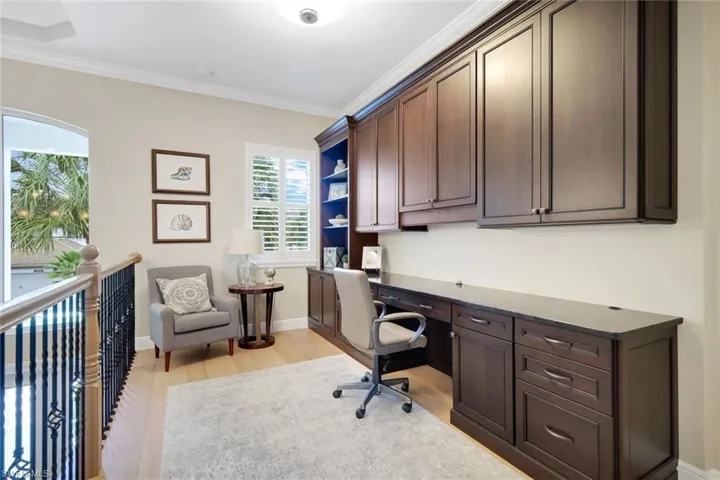 Home office with custom built in desk area