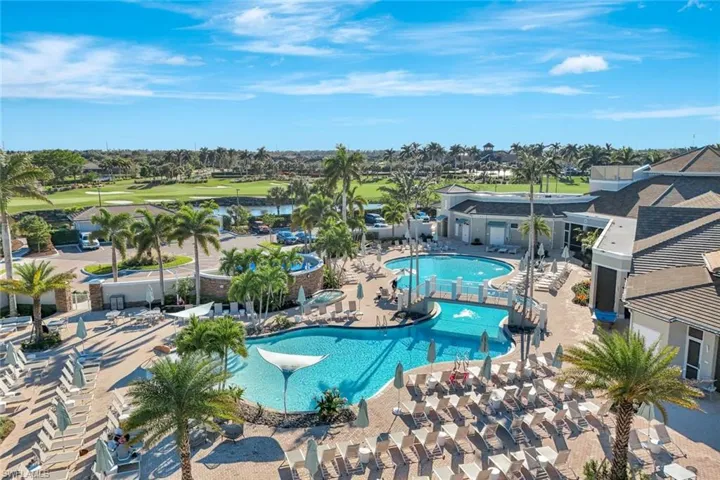 Community pool with a patio area
