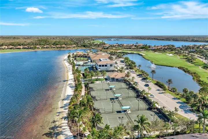 Aerial view of residential area with a large body of water