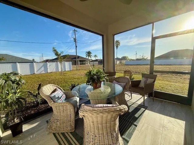 Sunroom / solarium with wood finished floors