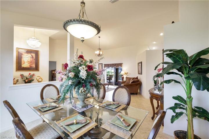 Formal Dining area with view to pool and spa.
