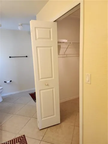 Primary Closet inside bathroom for privacy.