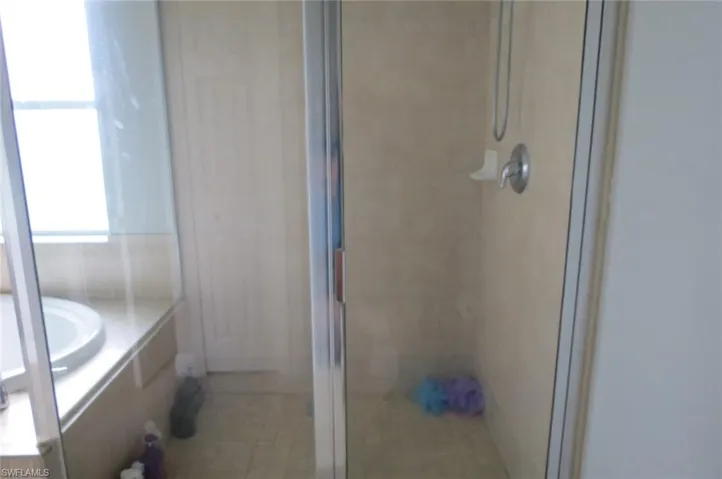 Bathroom with separate shower and tub