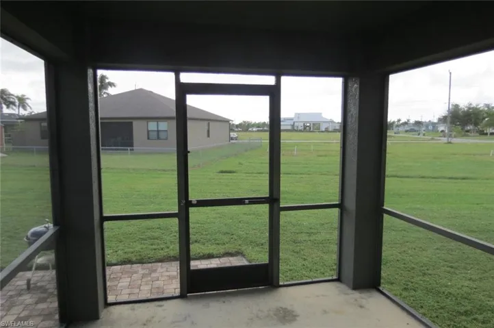 Unfurnished sunroom featuring plenty of natural light