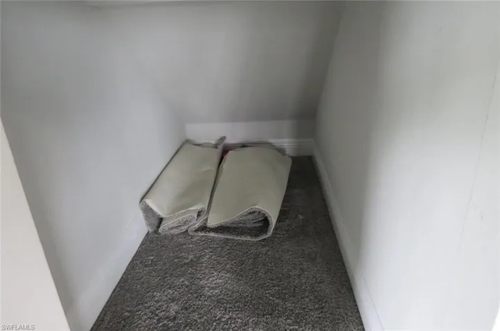 Stairs featuring carpet flooring