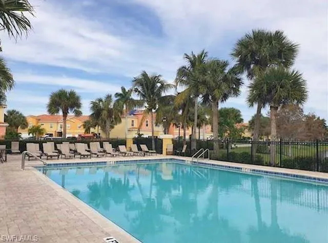 Community pool with a patio area