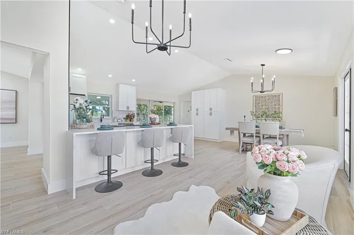 sitting area over lookingkitchen and dining room