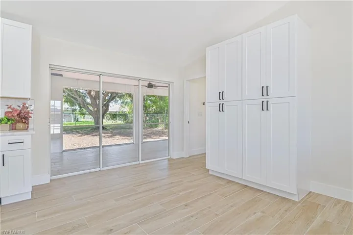 large pantry with lots of storage off kitchen