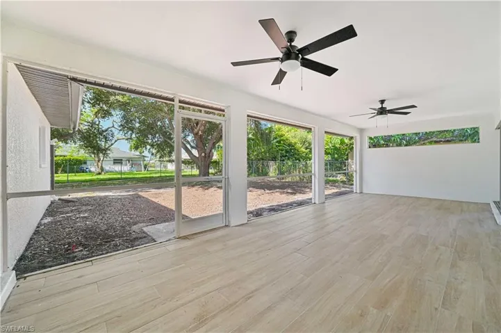 New sod installed after picture were taken, Huge lanai over looking the fence in back yard.