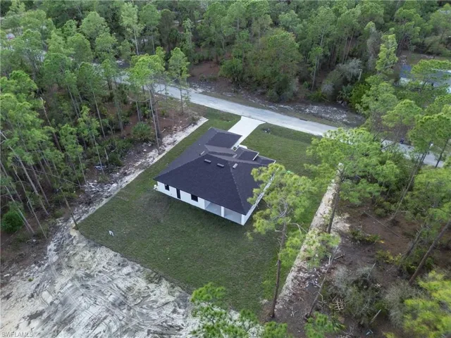 Aerial view with a wooded view
