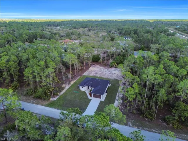 Aerial view with a wooded view