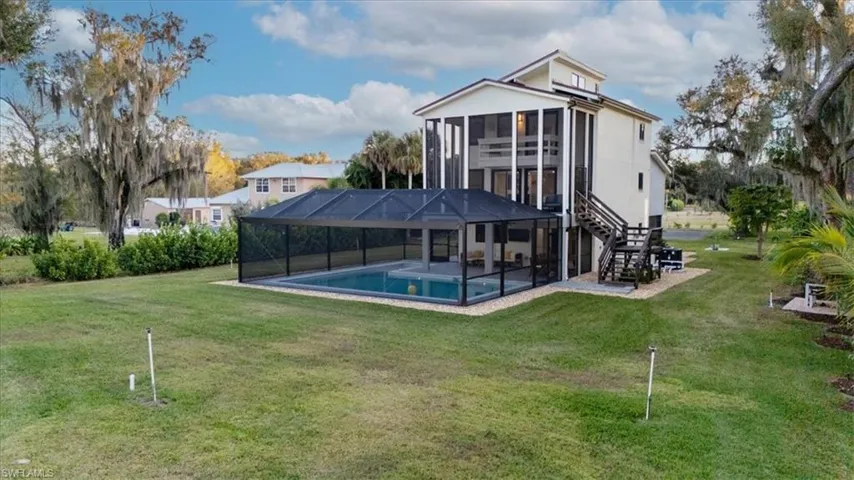 Rear view with new salt water heated pool