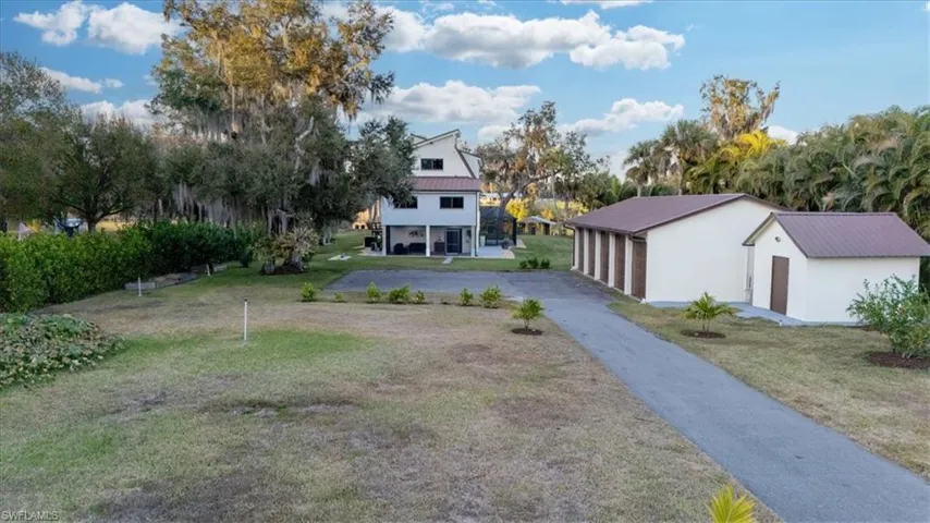Yard with 5 car detached garage