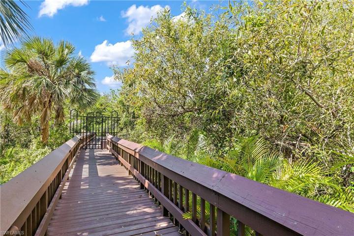 Boardwalk and shuttle stop at St. Nicole for the 2 Beach Clubs