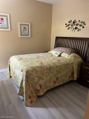 Bedroom featuring wood finished floors